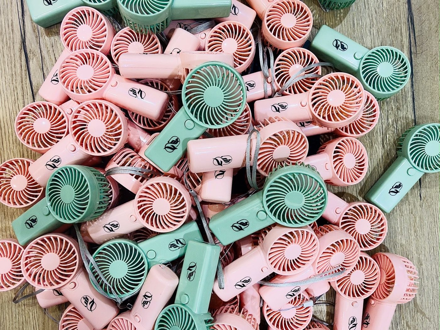 Lamatna — Printing on plastic fans, one per guest at a Dubai wedding