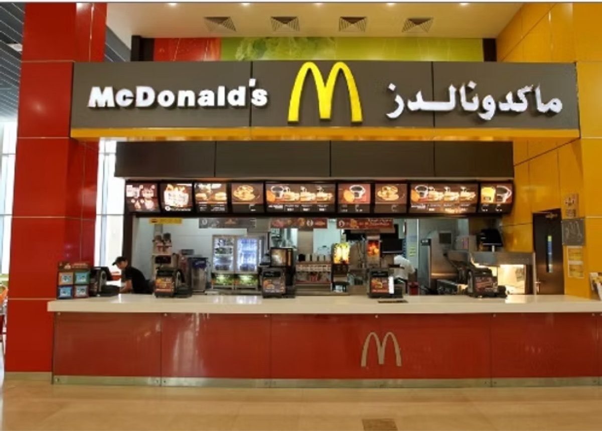 Large-format printed architectural glass features inside the McDonald's flagship at The Dubai Mall